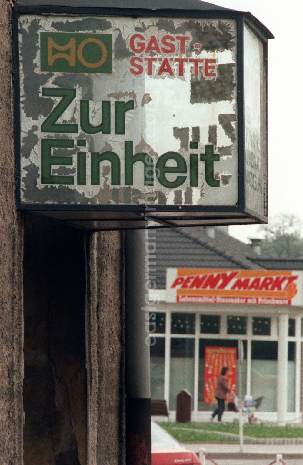 GDR picture archive: Staßfurt - Advertising sign for a former HO restaurant Zur Einheit in Stassfurt in the state of Saxony-Anhalt in the area of the former GDR, German Democratic Republic