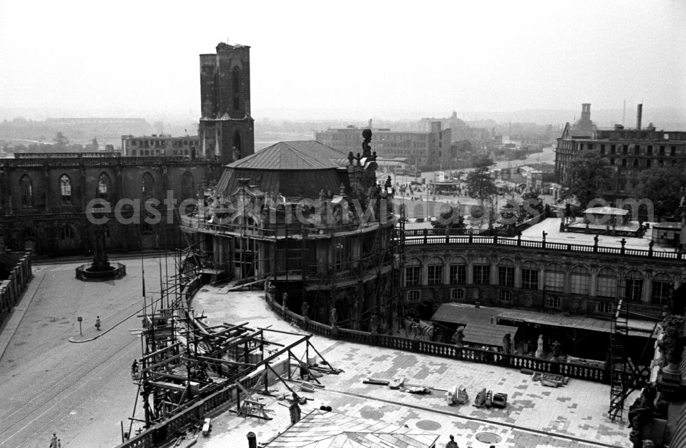 GDR picture archive: Dresden - Construction site for the reconstruction of the war-damaged ruins of the Dresden Zwinger on Theaterplatz - Sophienstrasse in the Altstadt district of Dresden in the state of Saxony on the territory of the former GDR, German Democratic Republic