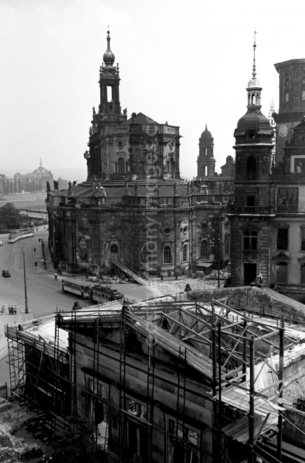 GDR photo archive: Dresden - Construction site for the reconstruction of the war-damaged ruins of the Dresden Zwinger on Theaterplatz - Sophienstrasse in the Altstadt district of Dresden in the state of Saxony on the territory of the former GDR, German Democratic Republic