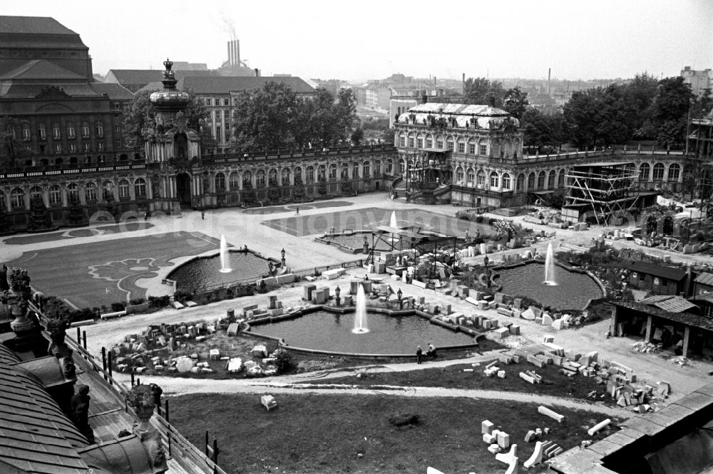 GDR picture archive: Dresden - Construction site for the reconstruction of the war-damaged ruins of the Dresden Zwinger on Theaterplatz - Sophienstrasse in the Altstadt district of Dresden in the state of Saxony on the territory of the former GDR, German Democratic Republic