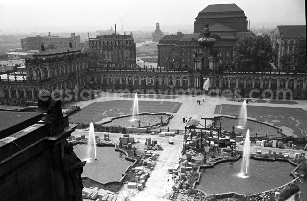 GDR photo archive: Dresden - Construction site for the reconstruction of the war-damaged ruins of the Dresden Zwinger on Theaterplatz - Sophienstrasse in the Altstadt district of Dresden in the state of Saxony on the territory of the former GDR, German Democratic Republic