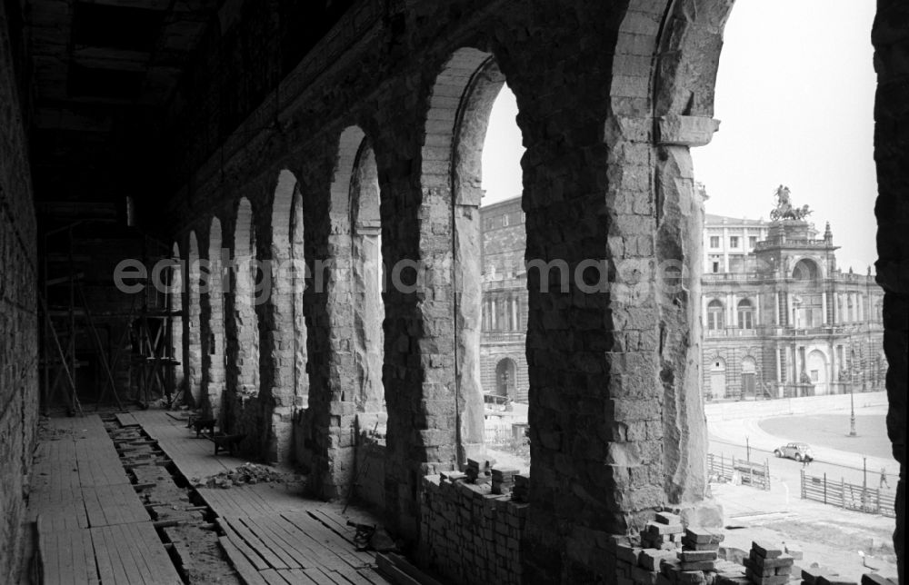 GDR image archive: Dresden - Construction site for the reconstruction of the war-damaged ruins of the Dresden Zwinger on Theaterplatz - Sophienstrasse in the Altstadt district of Dresden in the state of Saxony on the territory of the former GDR, German Democratic Republic