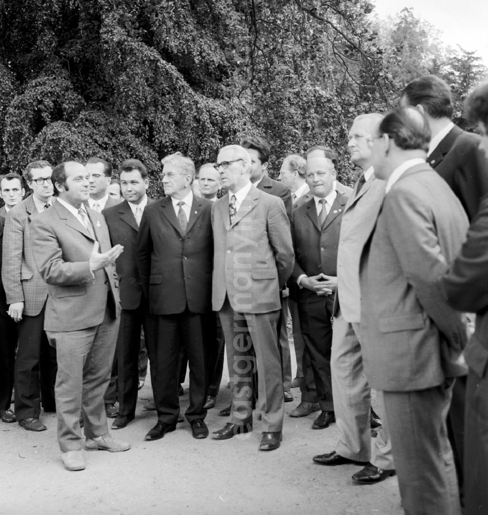 Schwerin: The chairperson of the council of ministers of the GDR Willi Stoph (1914-1999) and the member of the Politburo of the central committee Guenter Mittag (1926-1994) in the 14th working-class festival in Schwerin in the federal state Mecklenburg-West Pomerania in the area of the former GDR, German democratic republic. Here in a walk by the Schweriner park