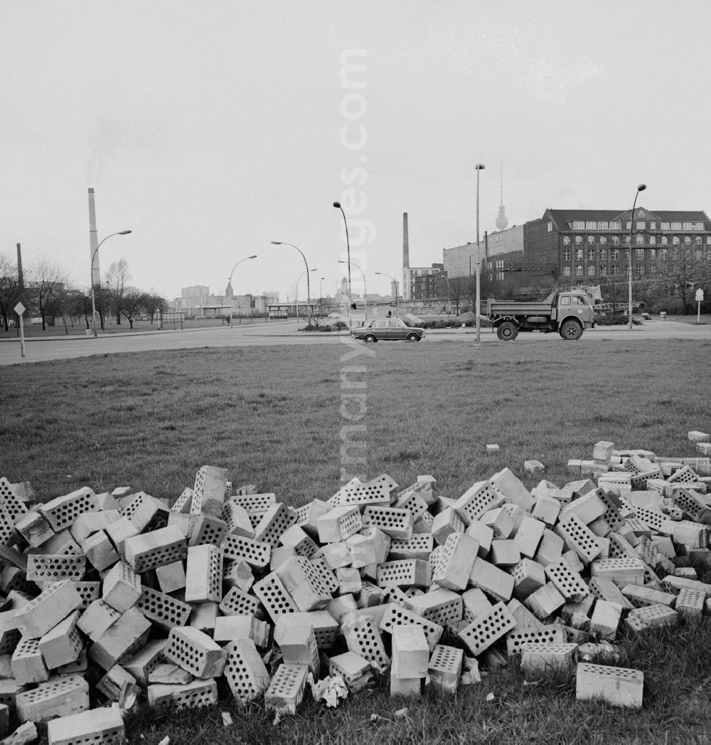 GDR picture archive: Berlin - Bricks stored on a meadow in Berlin - Friedrichshain