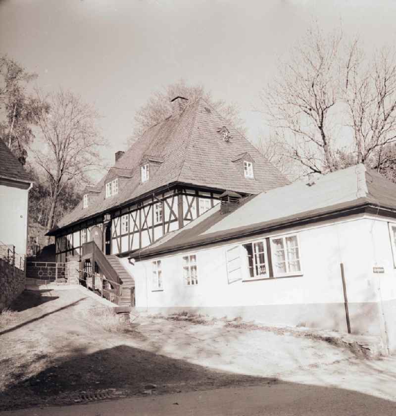 The mansion on the area the mining tin pit Frohnauer hammer in Anna's mountain book wood in the federal state Saxony in the area of the former GDR, German democratic republic. Today is here a restaurant, in the upper floor a bobbin room accessible to museum visitors is furnished
