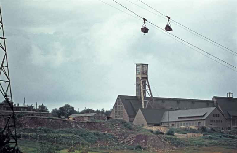 Mining mine and colliery with a winding tower for uranium extraction for SDAG Wismut in Annaberg-Buchholz, Saxony in the area of ??the former GDR, German Democratic Republic