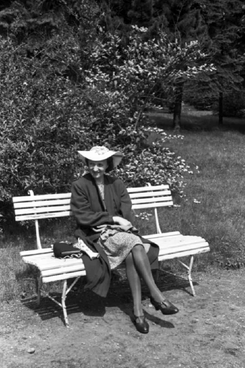 Woman with care on a park-bench in bath Drought mountain in the federal state Saxony-Anhalt in Germany
