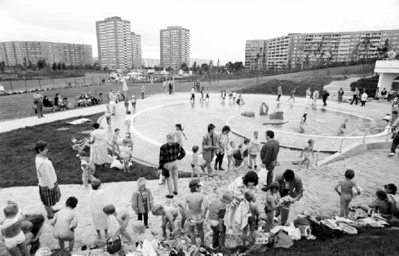 Children splash 'Kinderbad Platsch' in the park district Marzahn the former capital of the GDR, German Democratic Republic
