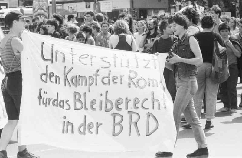 Demonstration against Roma deportation in Berlin. Demonstrators demonstrate and hold placards