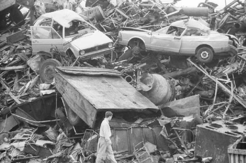 Car wrecks on the scrap yard of a metal processing plant on Herzbergstrasse in the Lichtenberg district of Berlin