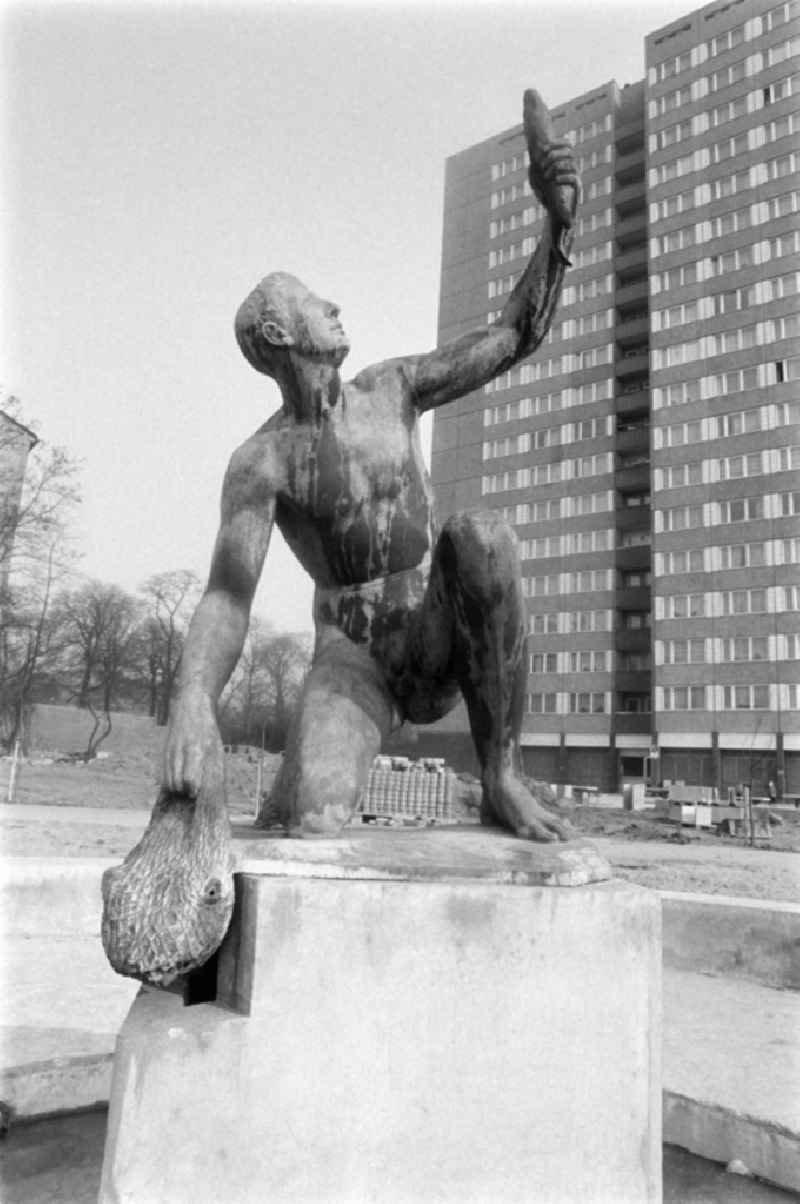 Fountain with bronze figure ' Young man with fish ' by Hans Latt near Frankfurter Allee corner Moellendorffstrasse in Berlin Eastberlin on the territory of the former GDR, German Democratic Republic