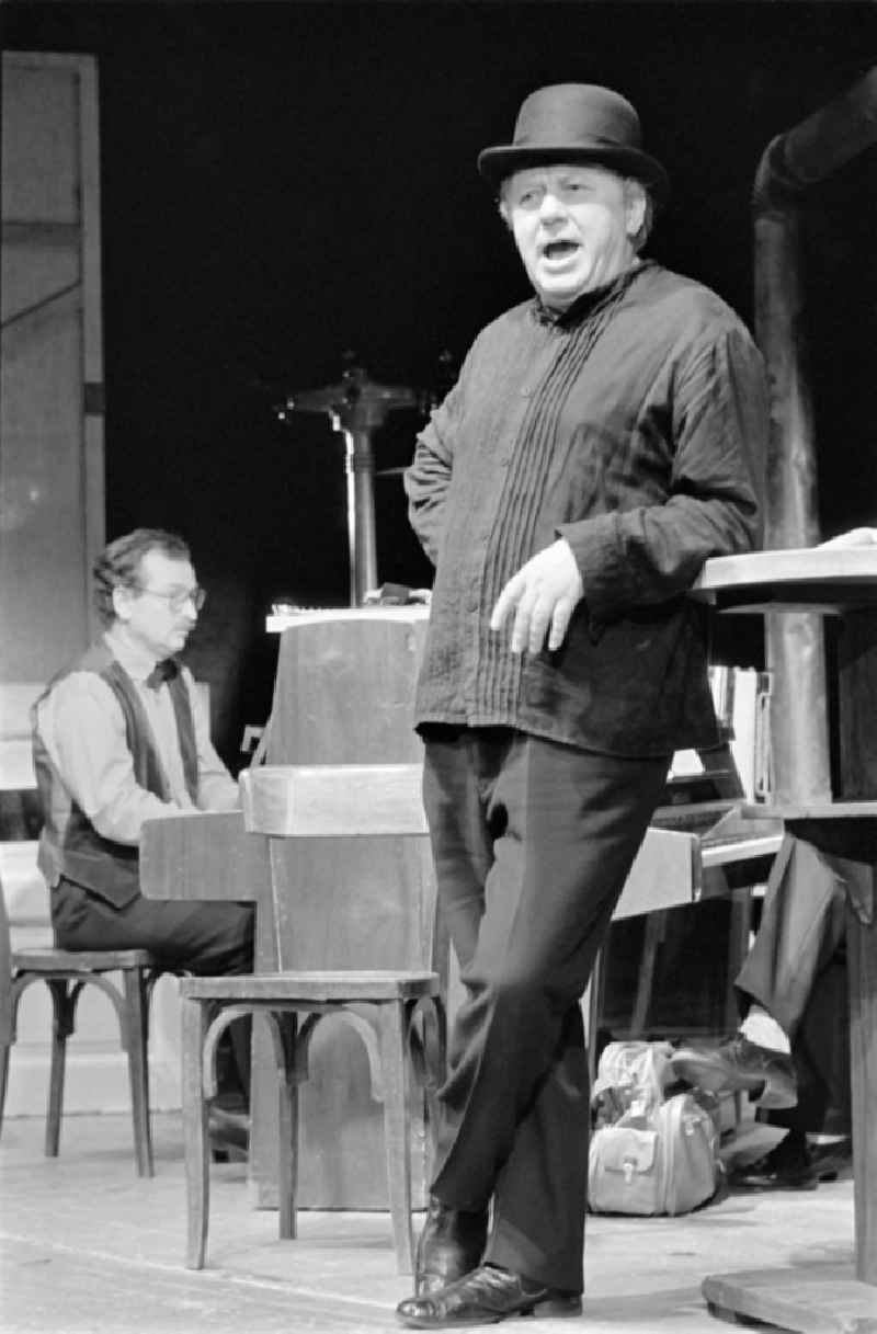 German Theatre Berlin - Berlin Songs From Then And Yesterday. Actors / actresses and performers in a theatre - scene and stage set in the Mitte district of Berlin, the former capital of the GDR, German Democratic Republic. On stage - Kurt Boewe in front, behind him Uwe Hilprecht at the piano