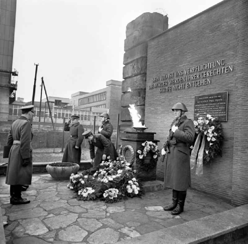 Participants in a commemoration event at the memorial for the border soldier Reinhold Paul Huhn who was shot (as a post in the 4th border detachment) in the rank of corporal on Schuetzenstrasse (former Reinhold-Huhn-Strasse) in the district of Mitte in the district Mitte in Berlin East Berlin on the territory of the former GDR, German Democratic Republic