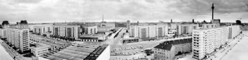 Panorama of the Karl-Marx-Allee with the Cafe Moskau, residential or multi-family homes and the currently under construction TV tower in Berlin-Mitte. Bestmögliche Qualität nach Vorlage!