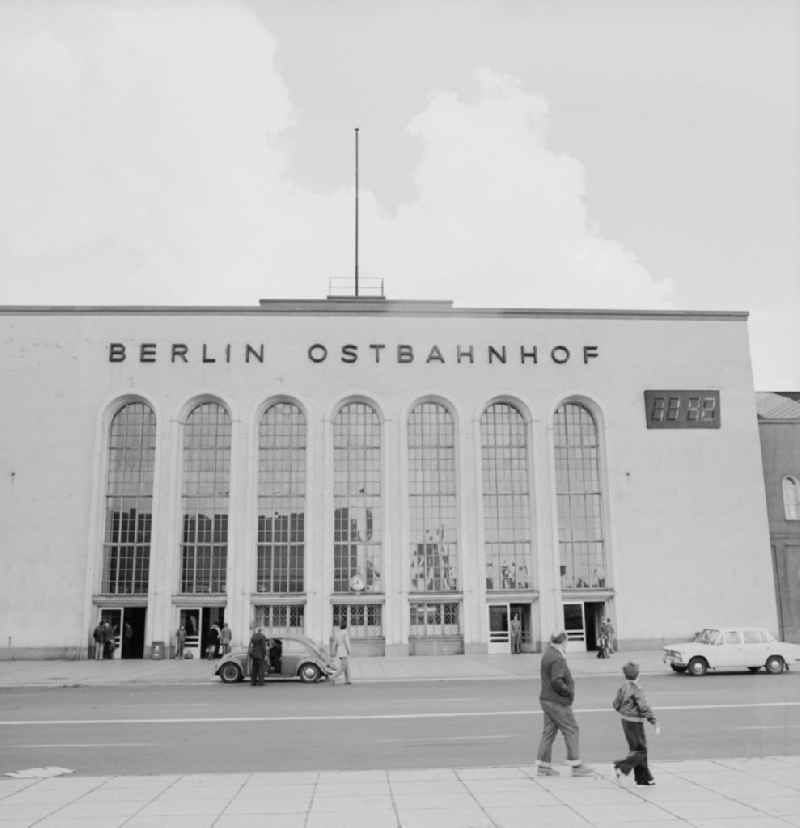 The main entrance to the Berlin Ostbahnhof with digital clock on the facade in Berlin - Friedrichshain. In 195