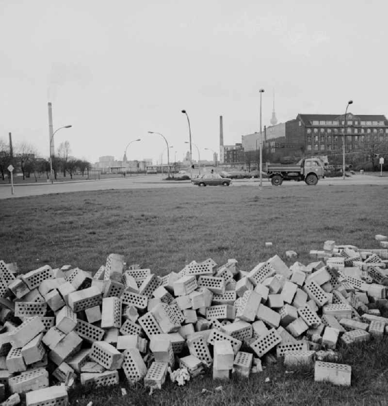 Bricks stored on a meadow in Berlin - Friedrichshain