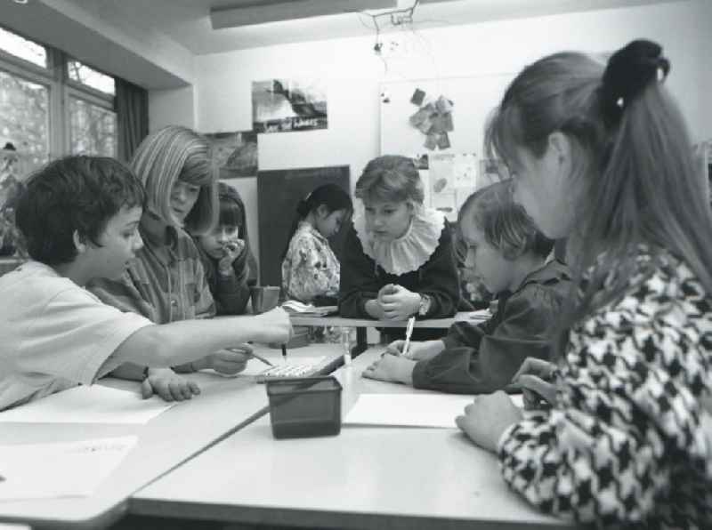 Group of students doing their homework in the school club in Berlin. The care center serves the child day care, after school, from elementary school students and is mostly visited through fourth grade