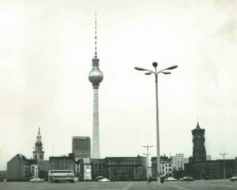 View from the road in the direction Spandau TV tower in Berlin-Mitte, with the Red Town Hall, the Berlin TV Tower, Bettenhochhaus of Hotel Stadt Berlin and St. Mary's Church