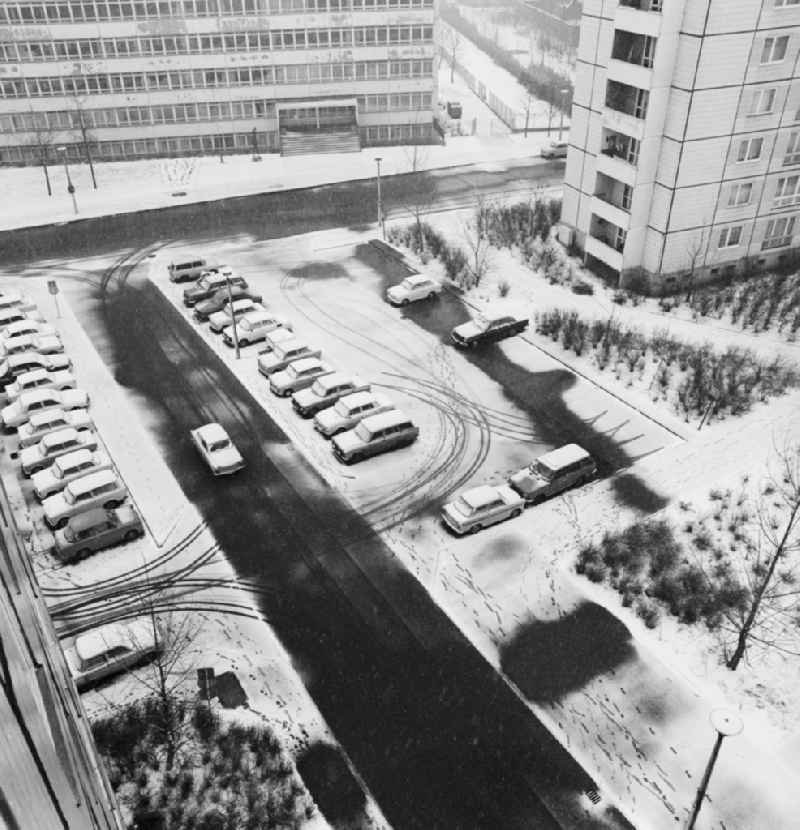 Snowy parking lot in a residential area in Berlin