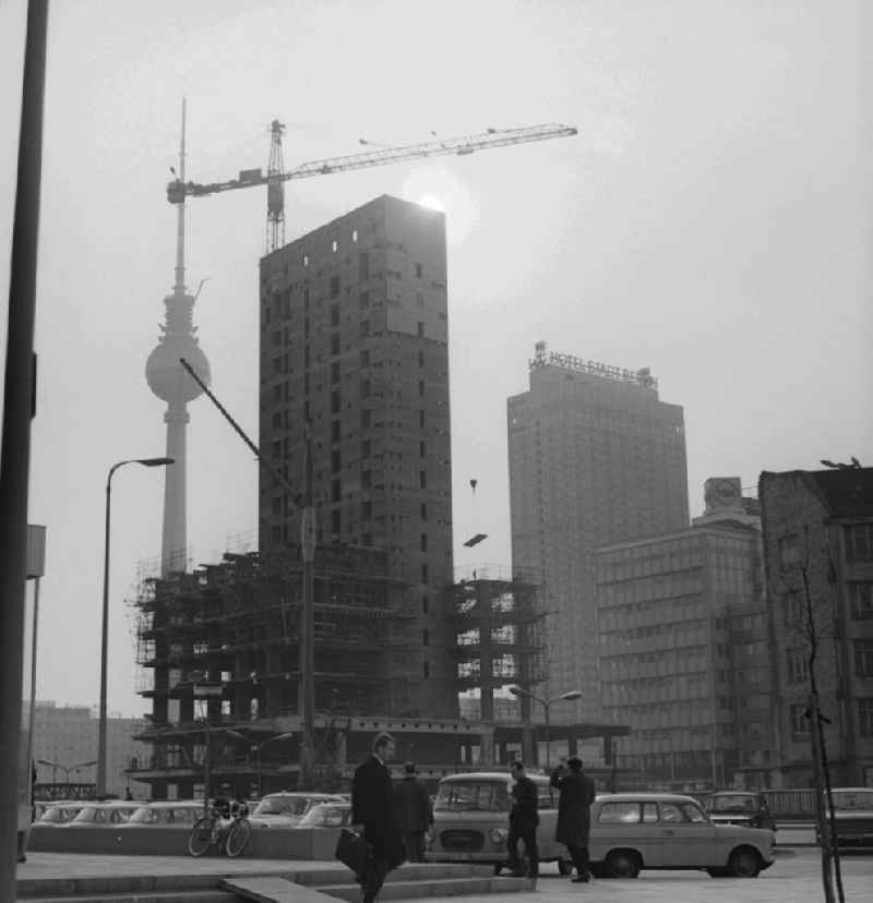 Construction house of traveling at Alexanderplatz in Berlin - Mitte. In the background of the Berlin TV Tower and the Hotel Stadt Berlin