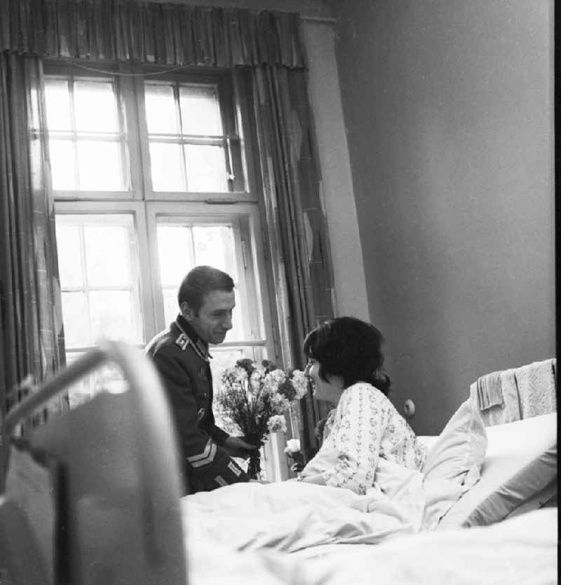 Soldier visiting his wife in hospital in Berlin