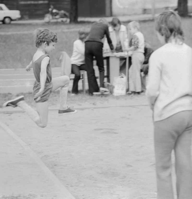 Students in Long Jump at the school sports festival in Berlin