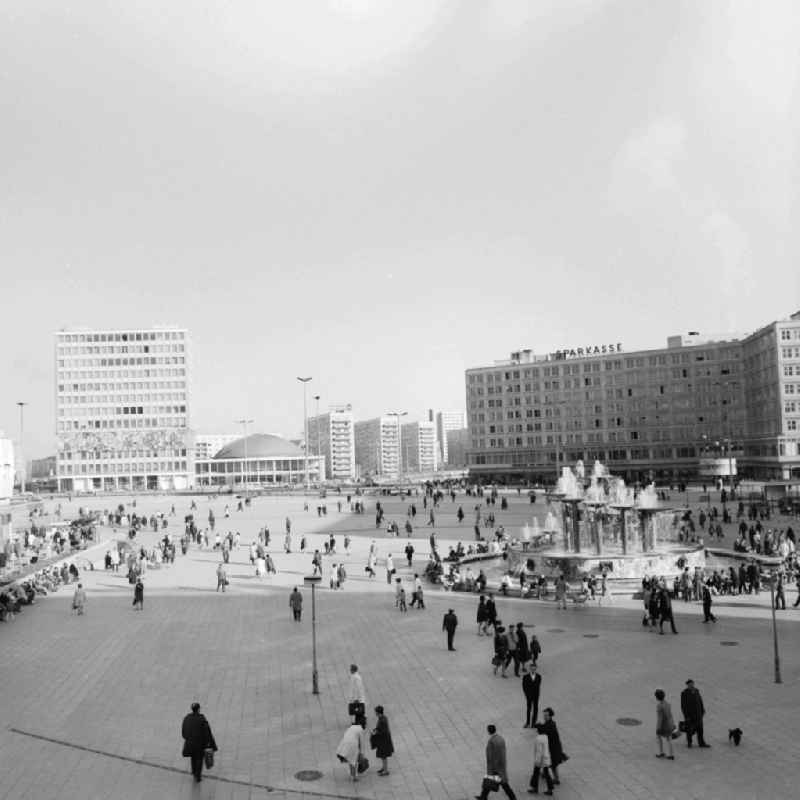 Look at the Alexanderplatz in Berlin. In the background v.l.n.r. the 'House of the Teacher', the Berliner Kongresshalle- today the Berlin Congress Center (BCC) and the headquarters of the Berlin Sparkasse- today Landesbank Berlin. In the foreground is the Fountain of International Friendship