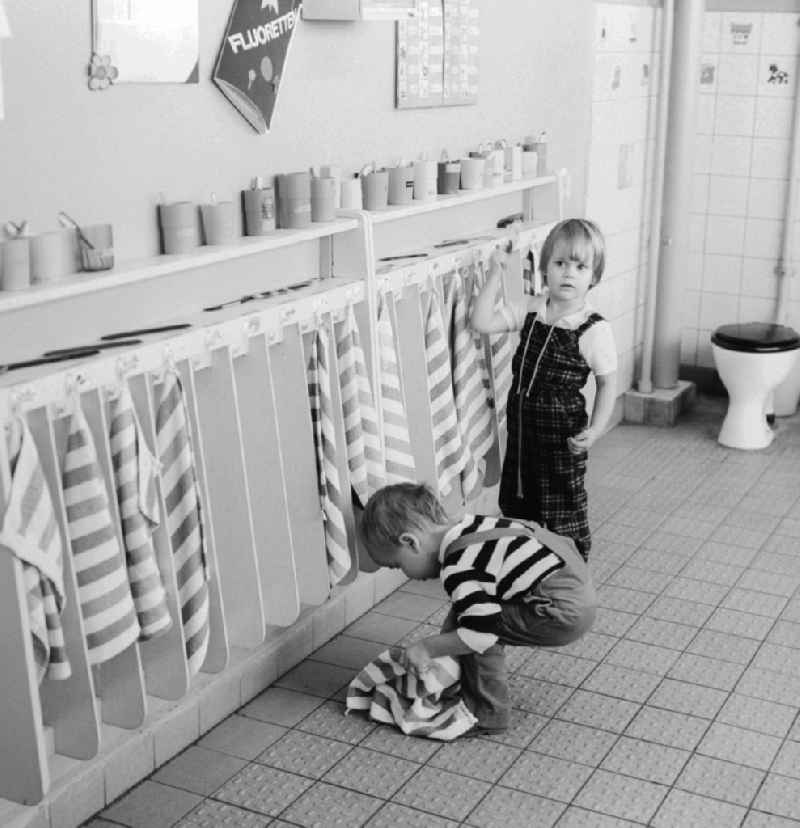 Children in the washroom of a crèche in Berlin, the former capital of the GDR, the German Democratic Republic