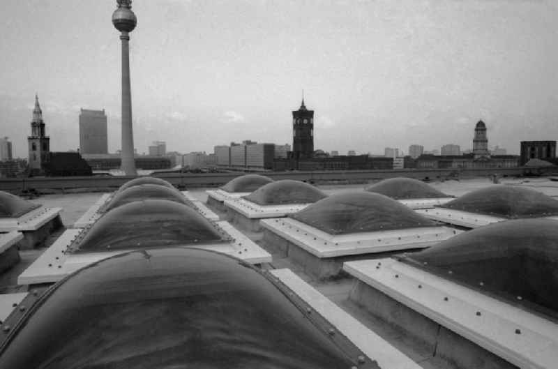 Daylight domes on the roof of the Palace of the Republic in Berlin, the former capital of the GDR, the German Democratic Republic. In the background v.l.n.r. the Saint Mary's Church, the hotel 'Berlin' The Rathauspassagen, the Red Town Hall and the seat provided Ministers of the GDR in the Old Town House