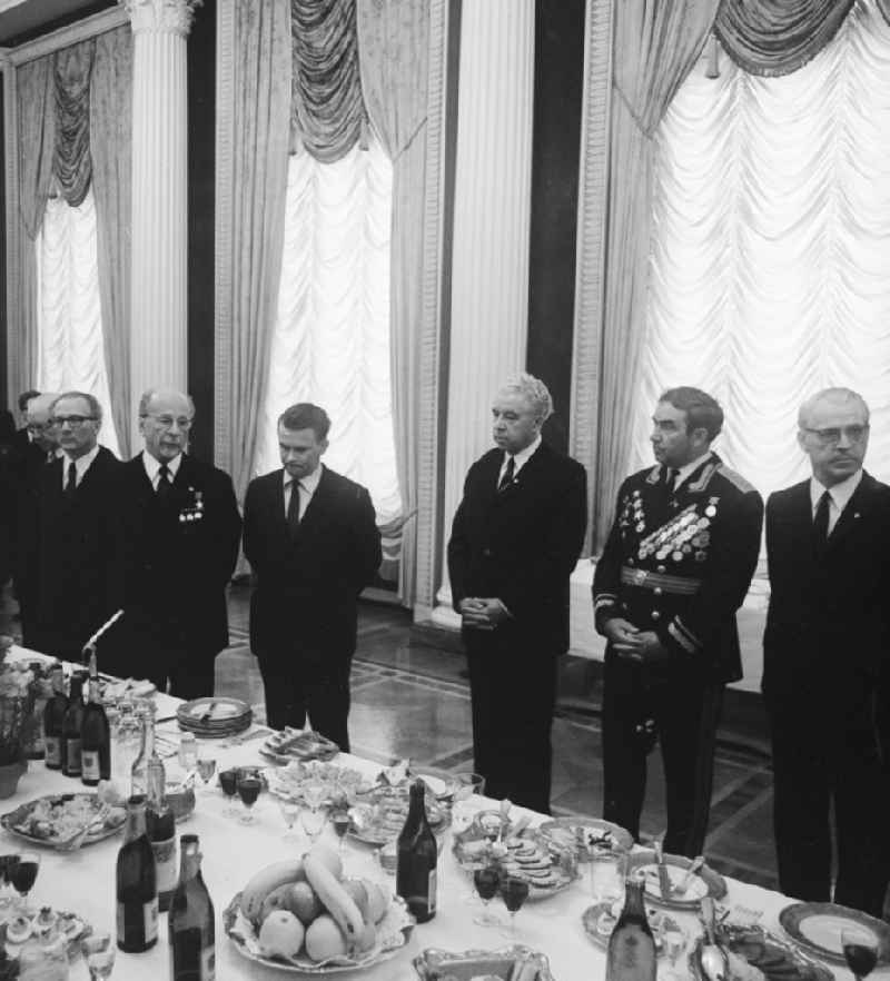 Reception on the occasion of the 26th anniversary of liberation from fascism in the Embassy of the Union of Soviet Socialist Republics (USSR) in Berlin, the former capital of the GDR, the German Democratic Republic. From right to left: Chairman of the Council of State Willy Stoph (1914 - 1999), Major General of the Red Army, and first Director General of the Wismut AG Mikhail Mitrofanovich Maltsev (1904 - 1982), Ambassador of the USSR Pyotr Andreyevich Abrassimov (1912-20