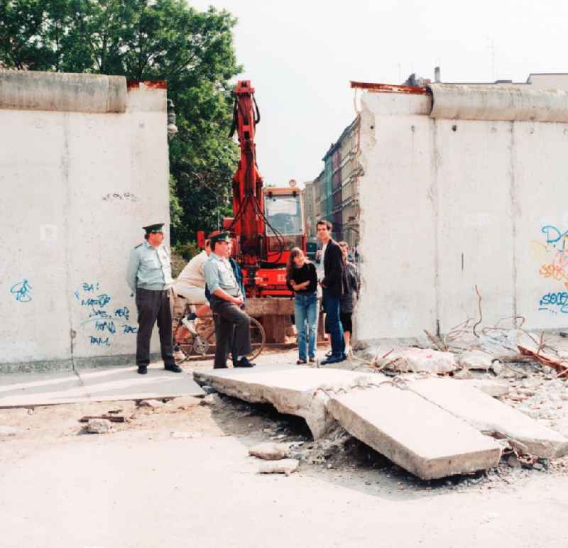 Dismantling of concrete segments of the Berlin Wall in Berlin, the former capital of the GDR, German Democratic Republic. Today it houses the memorial is the Berlin Wall