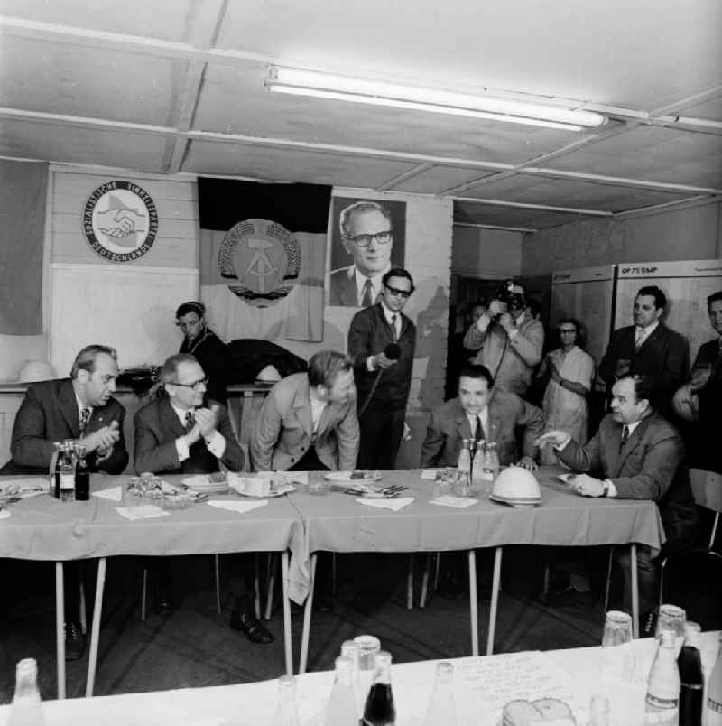 Erich Honecker, secretary general of the central committee ZK of the SED socialist united party of Germany and chairpersons of the council of state visited the construction workers of the new building quarter 'Amtsfeld' - today Allende Viertel - in Koepenick as well as the working of the concrete work Gruenau in Berlin, the former capital of the GDR, German democratic republic