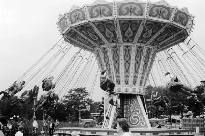 Chain carousel on the area of the cultural park Plaenterwald in Berlin, the former capital of the GDR, German democratic republic