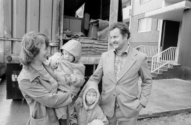 A family with two children with the move in a modern apartment in the district of Hohenschoenhausen in Berlin, the former capital of the GDR, German democratic republic