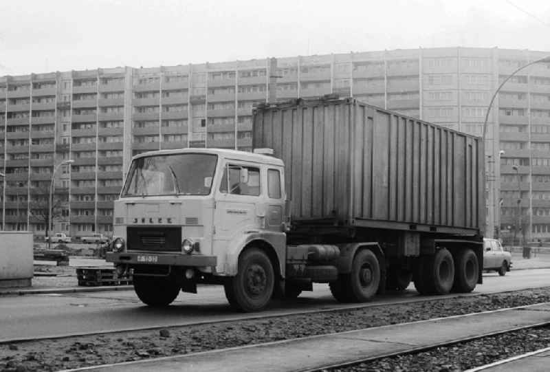 A truck of the type Jelcz 315 with an oversea container on the Lichtenberger street in Berlin, the former capital of the GDR, German democratic republic