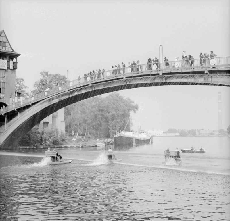 The abbey bridge - footbridge over the Spree to the island of the youth in Berlin, the former capital of the GDR, German democratic republic. The bridge is an concrete-girder bridge and stands under conservation of monuments and historic buildings