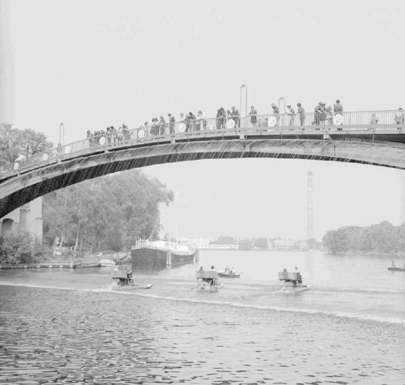 The abbey bridge - footbridge over the Spree to the island of the youth in Berlin, the former capital of the GDR, German democratic republic. The bridge is an concrete-girder bridge and stands under conservation of monuments and historic buildings
