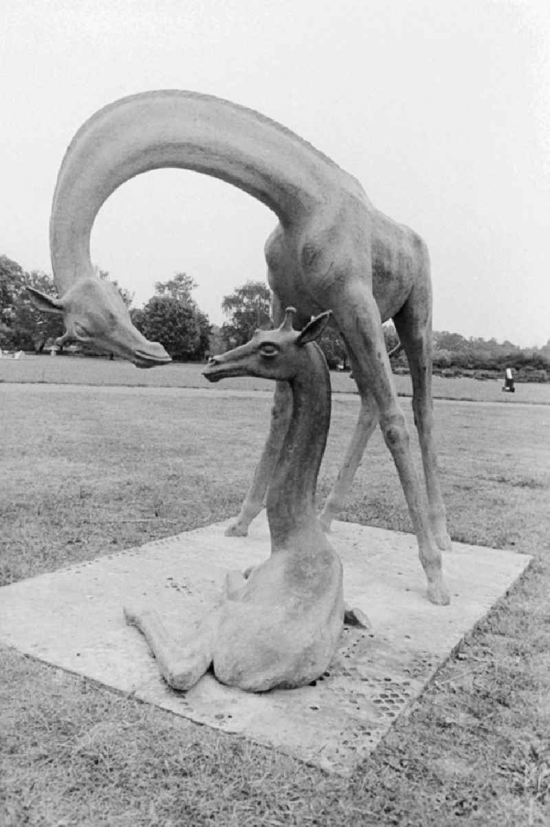 Two giraffes - plastic of German sculptor Hans-Detlev Henning in the Treptower park in Berlin, the former capital of the GDR, German democratic republic