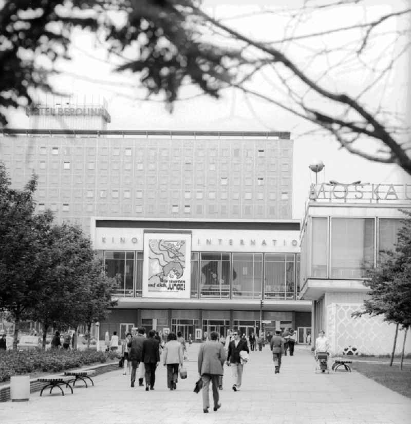 The cinema INTERNATIONAL with the film poster for the Soviet film 'We wait for you boy' in the Karl Marx Allee in Berlin, the former capital of the GDR, German democratic republic. In the background the hotel BEROLINA