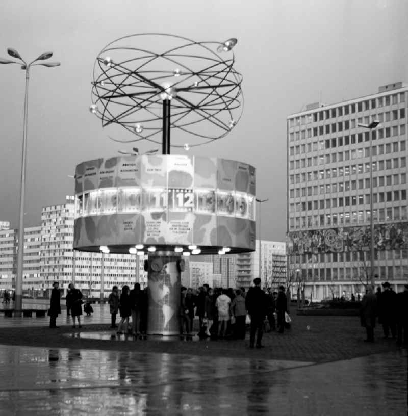 The Urania World Time Clock on Alexanderplatz is a popular meeting place for Berliners and tourists in Berlin, the former capital of the GDR, the German Democratic Republic