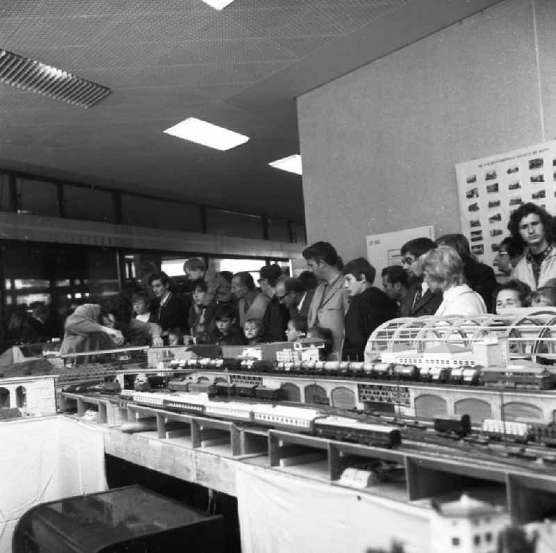 Visitors to a model railway exhibition in Berlin, the former capital of the GDR, German Democratic Republic