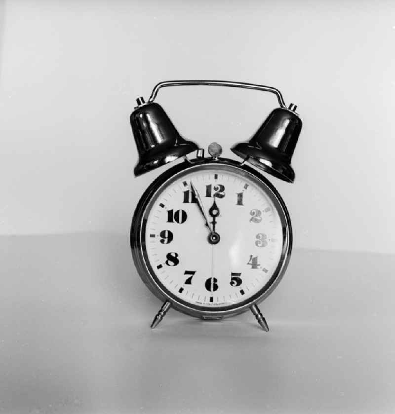 Symbolic picture - Alarm clock ' Five before twelve' in Berlin, the former capital of the GDR, German Democratic Republic