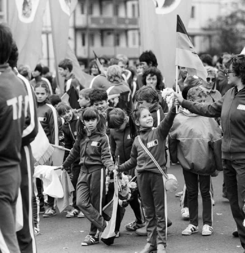 Athletes of the sports club TSC (Berliner Turn- und Sportclub)Berlin will meet with flags and other winged elements for the 1st May Demonstration in Berlin, the former capital of the GDR, German Democratic Republic