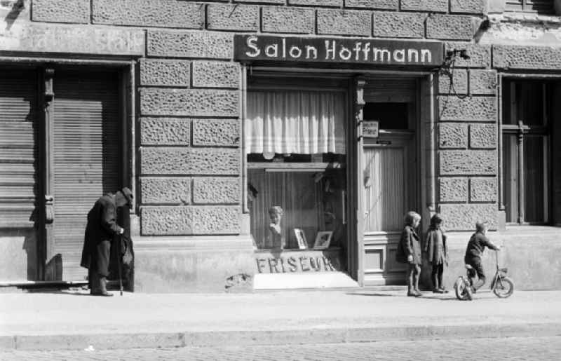 Hairdressing salon for ladies and gentlemen in Berlin, the former capital of the GDR, German Democratic Republic