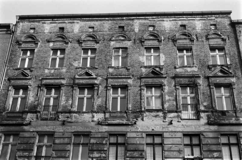 Ruinous house facade of an old building in Berlin - Prenzlauer Berg, the former capital of the GDR, German Democratic Republic
