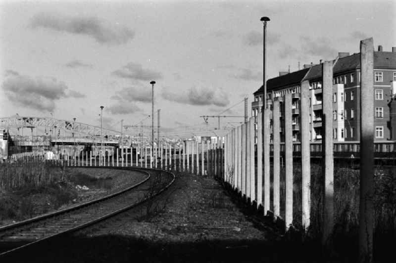 Former course of the Wall at the S-Bahn station Bornholmer Strasse with view towards the center and the TV tower in Berlin - Prenzlauer Berg, the former capital of the GDR, German Democratic Republic