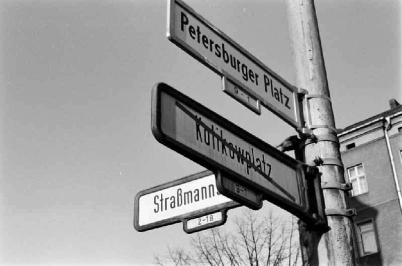 A new street sign shows the renaming of Kotikowplatz in Petersburger Platz on the corner Strassmannstrasse in Berlin - Friedrichshain, the former capital of the GDR, German Democratic Republic