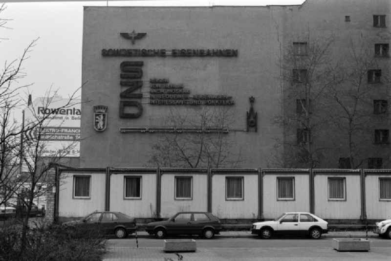 Advertisement for 'Soviet Railways SZD Travel from Berlin to Moscow' is located on a building in the Johannisstrasse in Berlin - Mitte, the former capital of the GDR, German Democratic Republic