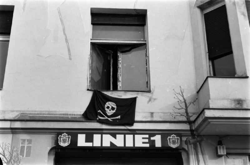 Entrance to the Tommy Weisbecker House (TWH) with the words 'Linie 1' and skull banner in Berlin - Kreuzberg