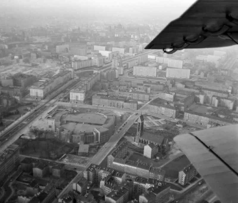 Aerial view of the sports hall Deutsche Sporthalle on Karl-Marx-Allee and the Catholic St. Pius Church on Palisadenstrasse in the district Friedrichshain in Berlin, the former capital of the GDR, German Democratic Republic